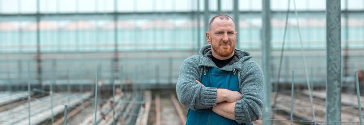 Greenhouse cleaning employee